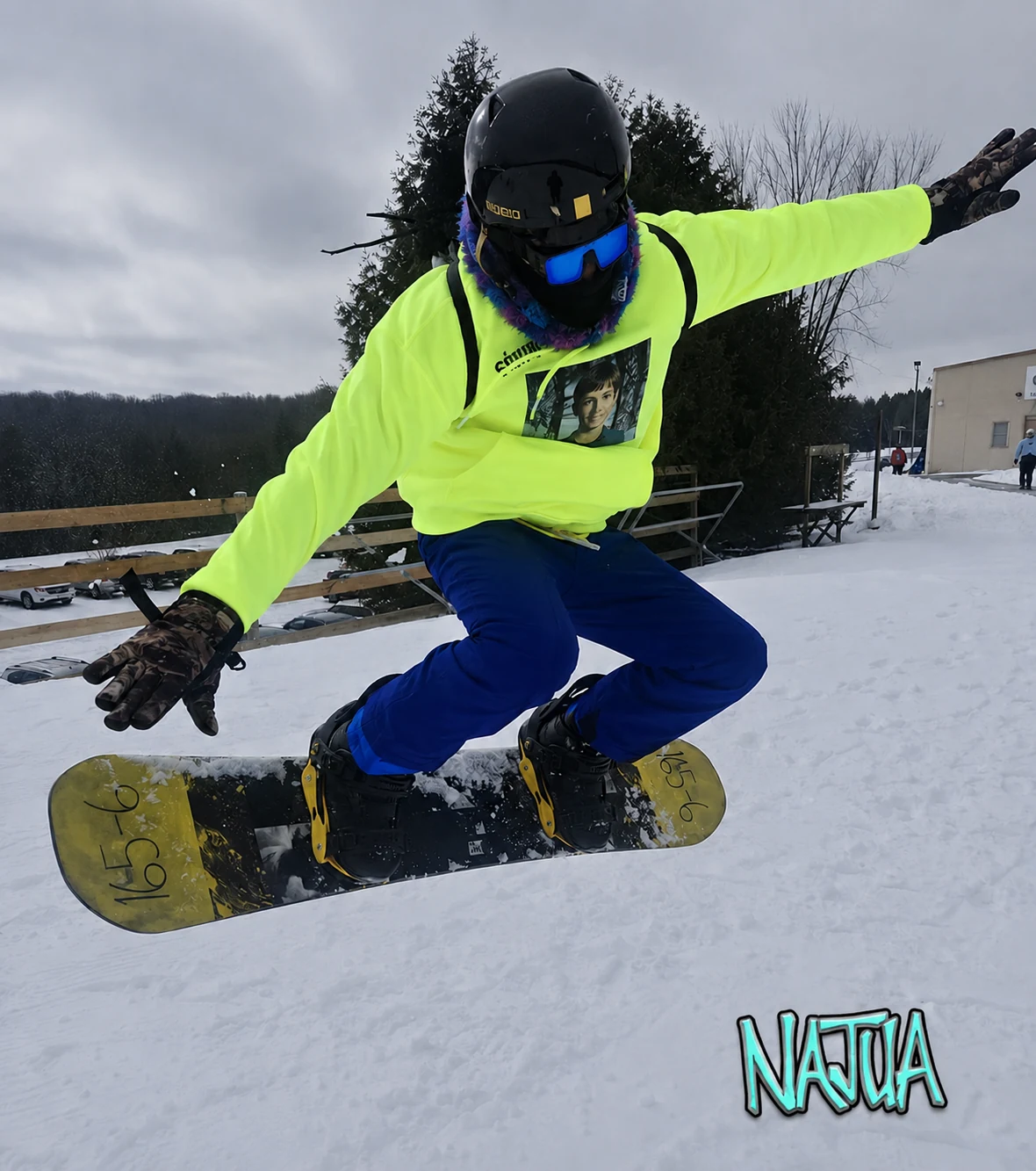 Najua snowboarding streetwear action photo